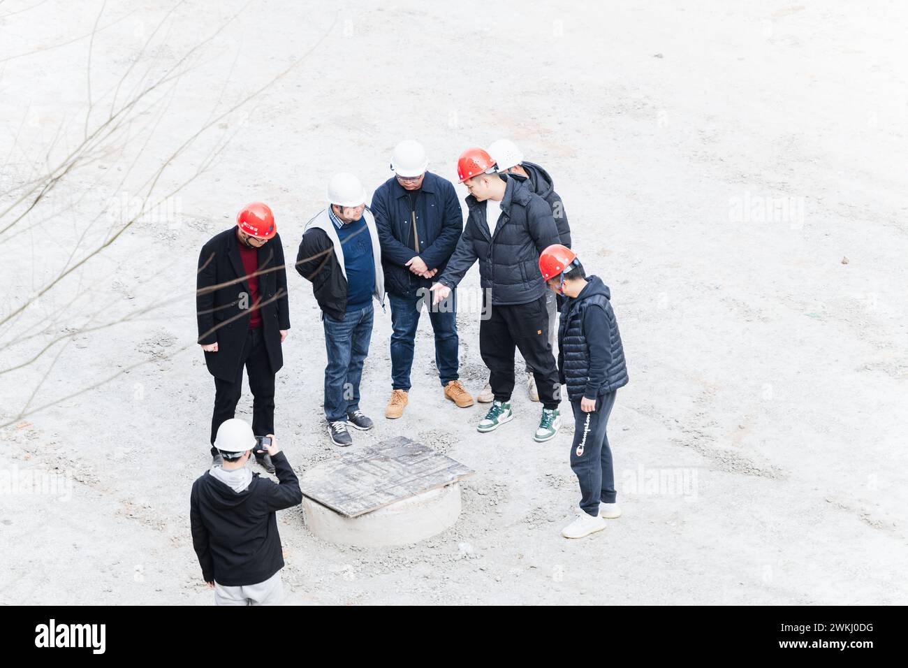 Workers checking quality at construction site Stock Photo