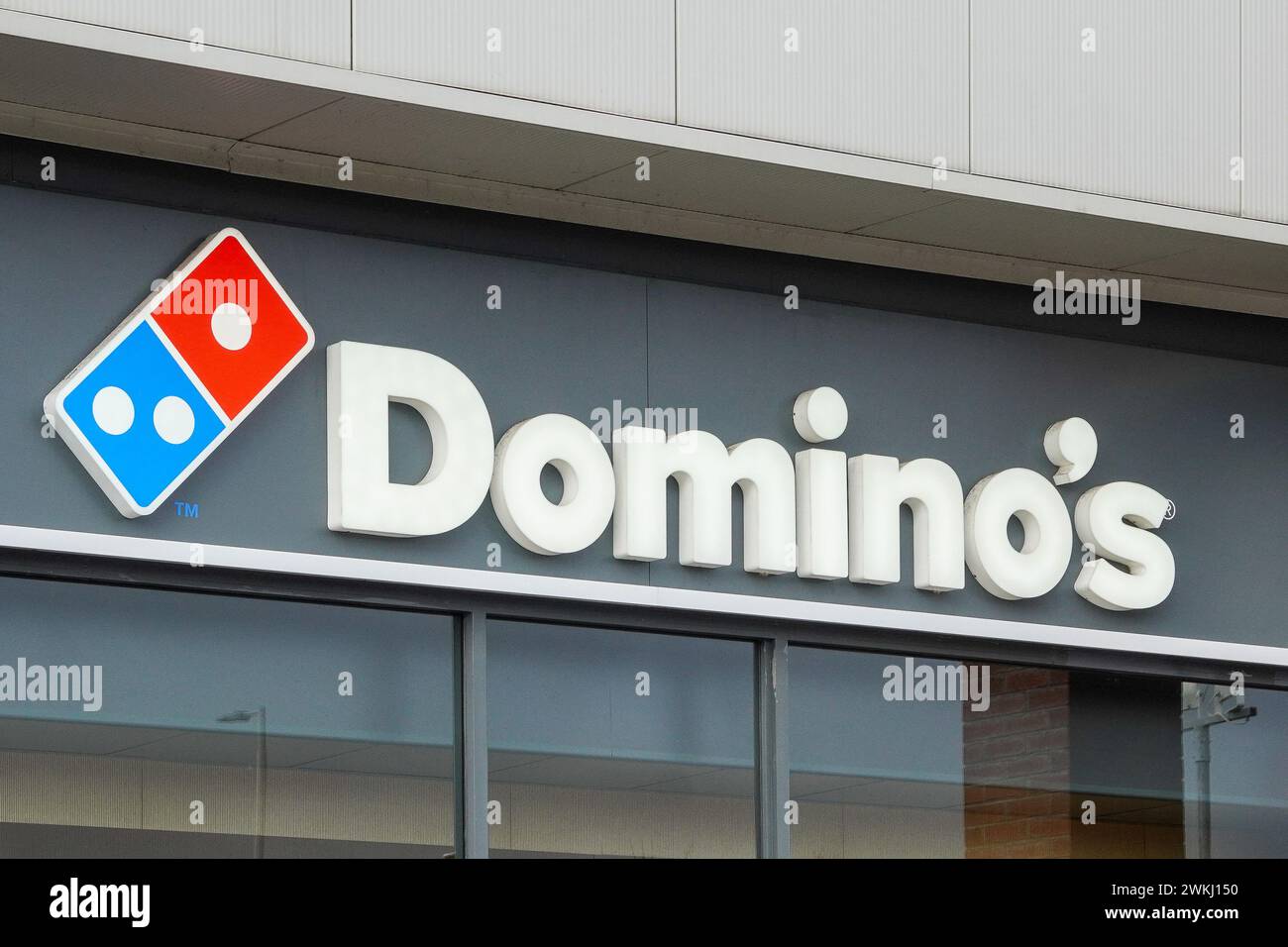Signage for the fast food outlet, Domino's , Ayr, UK Stock Photo