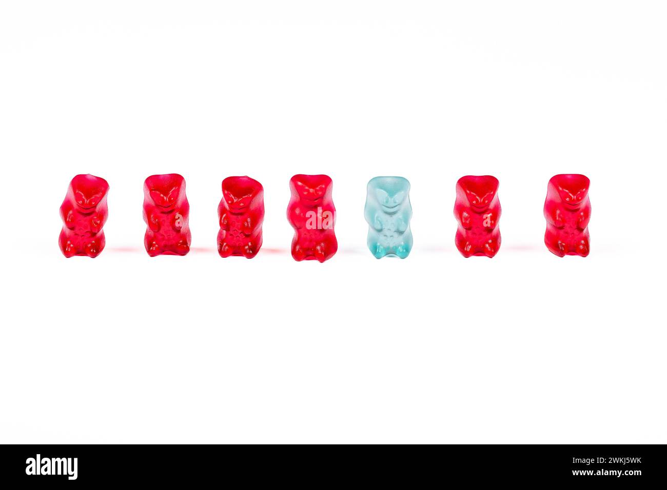 Diverse Gummy Bear Lineup: Standing Out in a Sweet World. Stock Photo