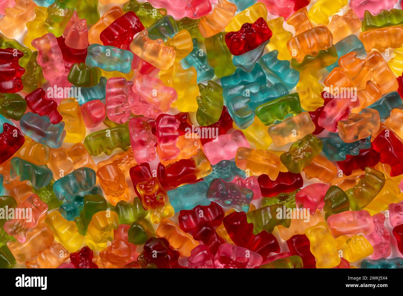 Colorful Gummibears Texture Background: A Sweet Symphony of Flavors annd Colors. Stock Photo