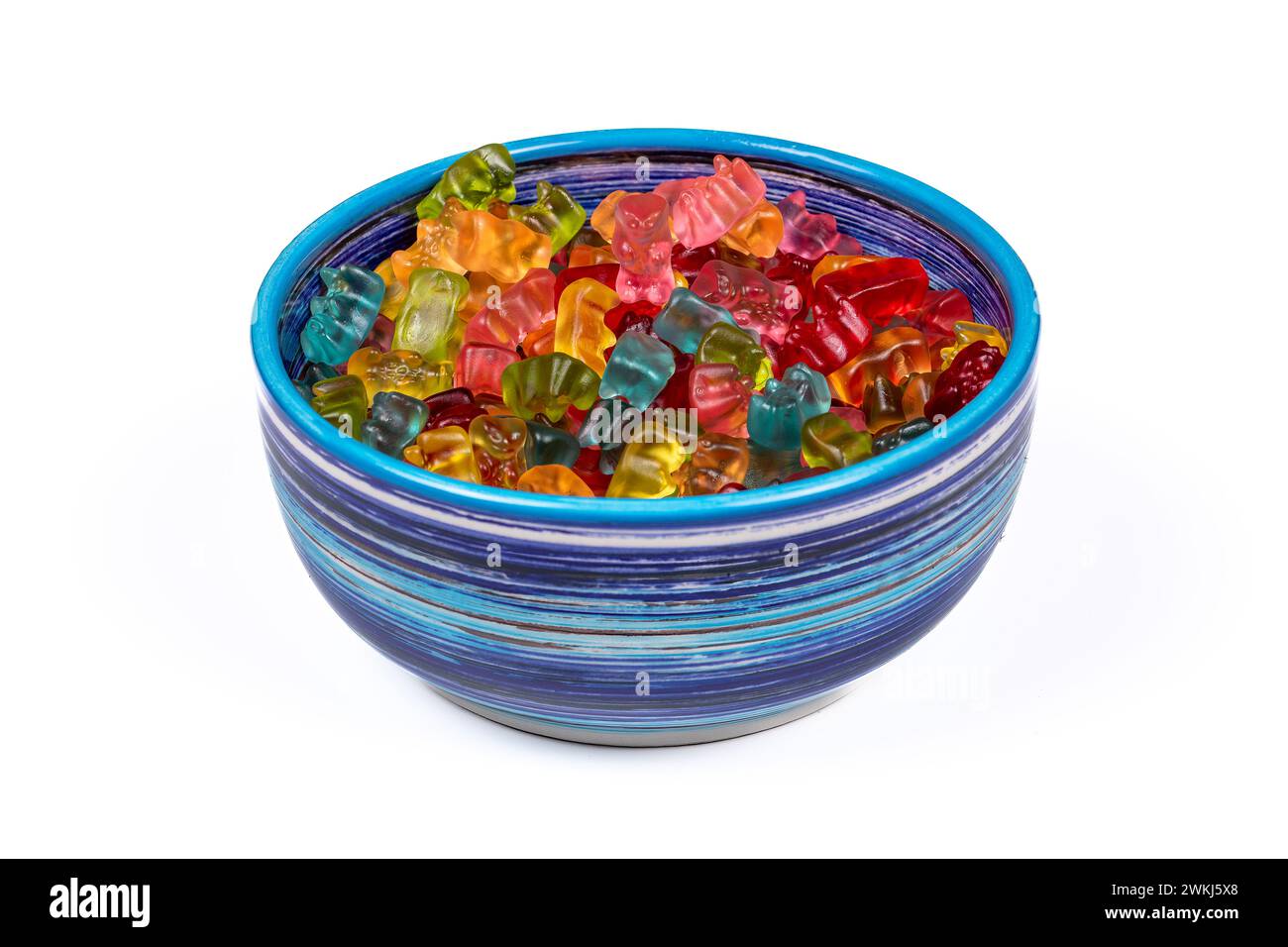Colorful Gummibears Assortment in Bowl with Special Flavors - Sweet Delights on White Background, Side View. Stock Photo