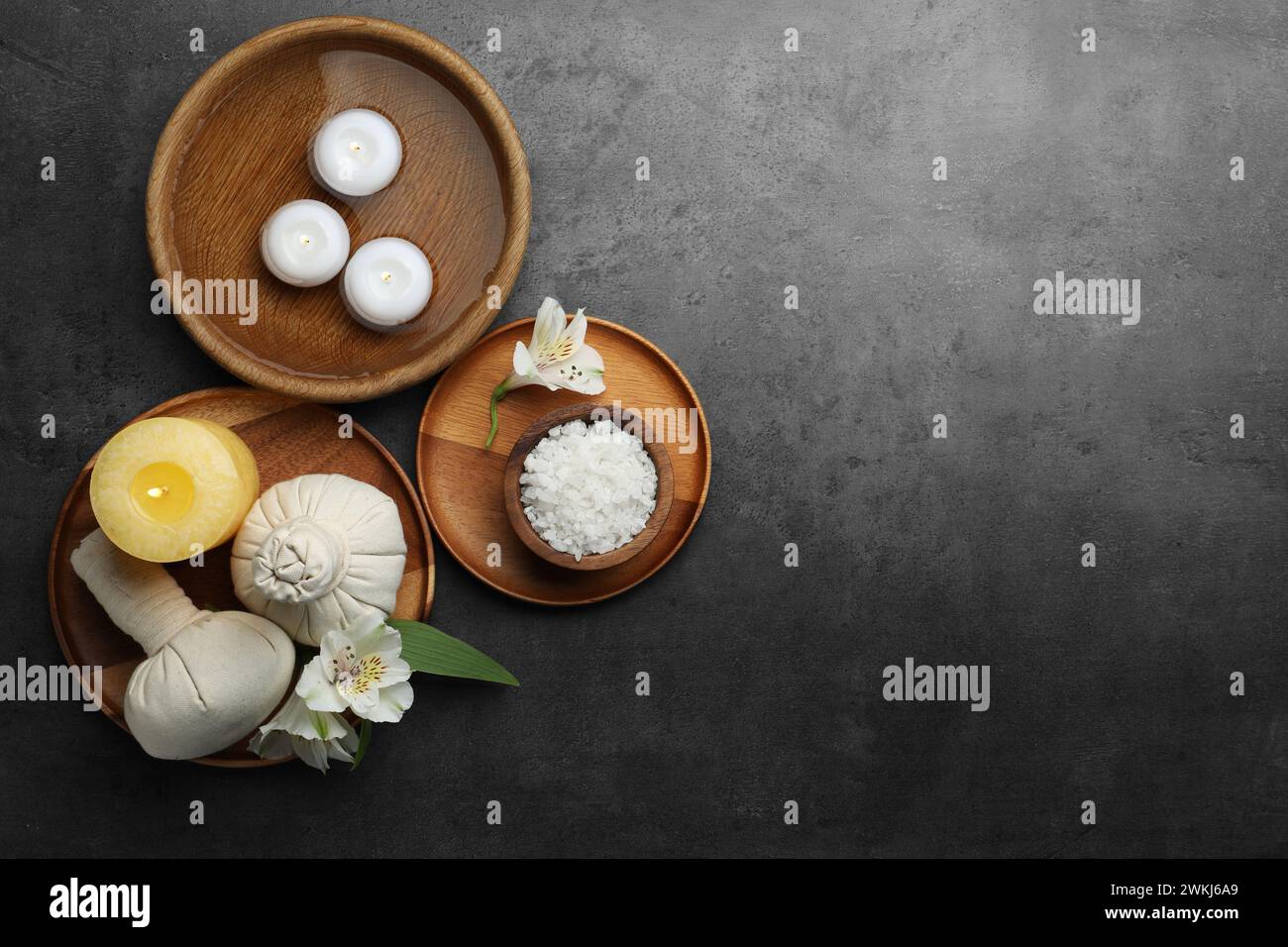 Flat lay composition with different spa products and lily flowers on ...