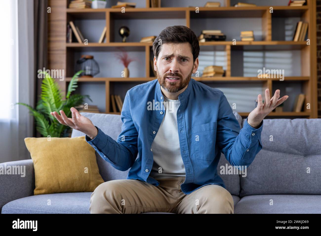 Confused beard man gesturing hi-res stock photography and images - Alamy