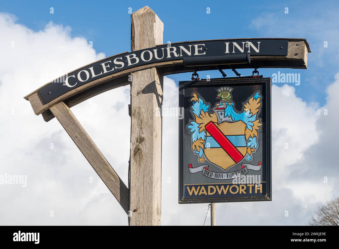 Colesbourne Inn pub and dining in the cotswolds village of Colesbourne, Gloucestershire, England, UK. Pub sign, Wadworth Stock Photo