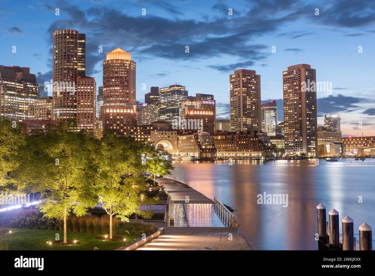 Boston, Massachusetts, USA downtown city skyline and pier at twilight. Stock Photo