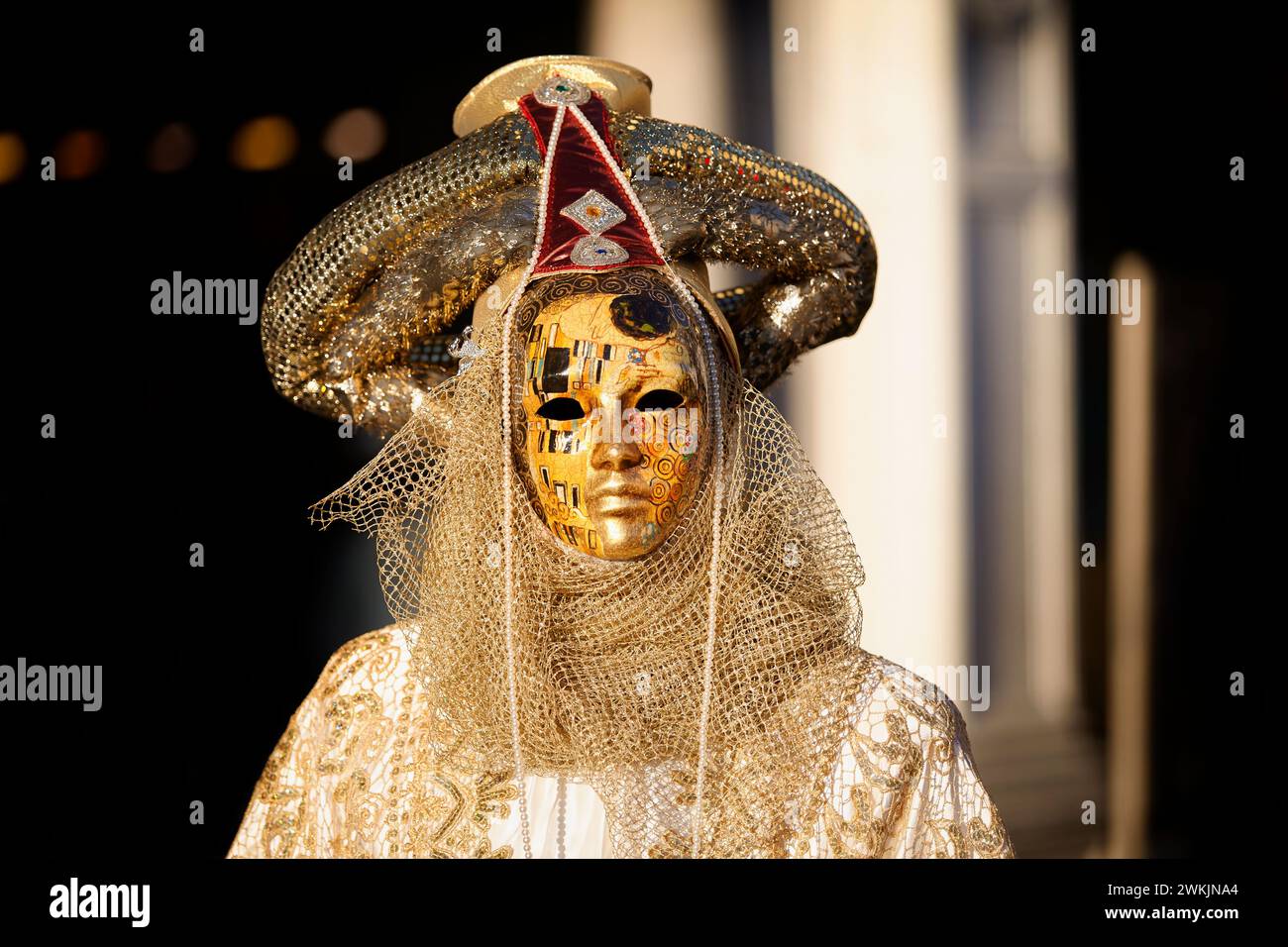 A Venice carnival mask in St. Marks square, Venice, Veneto, Italy. Stock Photo