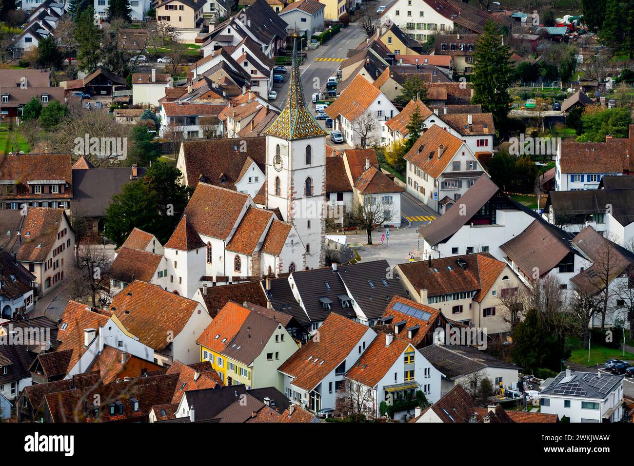 Elevated view of the fortified Church of Saint Arbogast at municipality of Muttenz. Canton of  Basel-Land, Switzerland. The church is the only one in Stock Photo