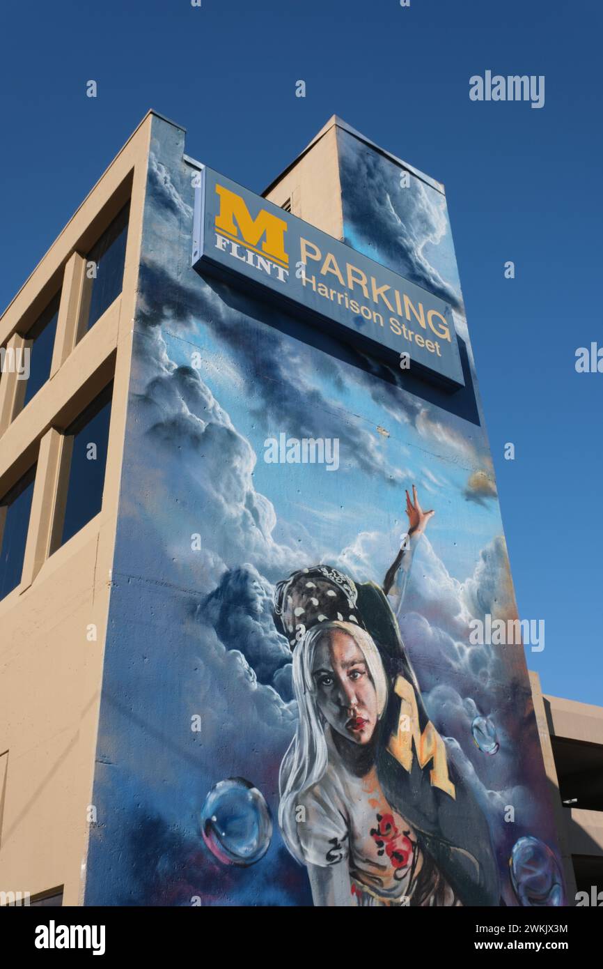 University of Michigan Flint parking structure with a mural, in Flint Michigan USA Stock Photo