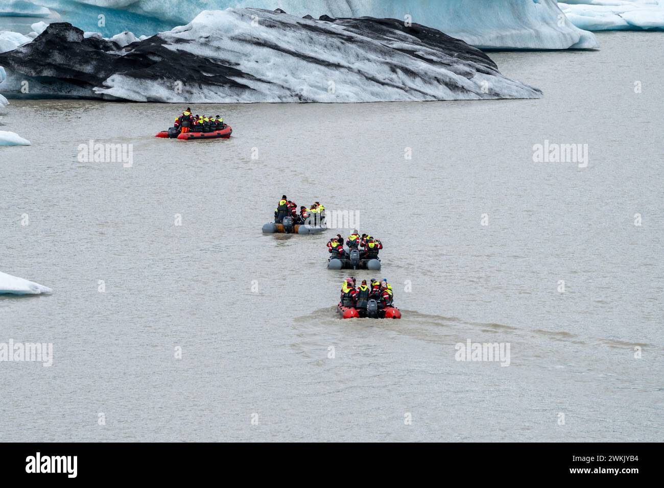 Vatnajokull, Iceland - July 7, 2023: Tourists leave on iceberg zodiac boat tours to view the Fjallsarlon glacier lagoon Stock Photo