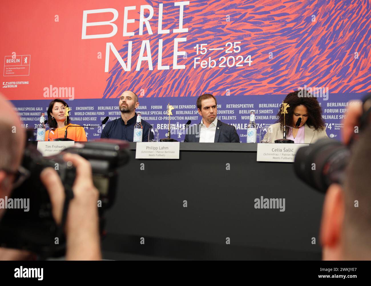 21 February 2024, Berlin: Camille Tricaud (l-r), executive producer, Tim Frohwein, Philipp Lahm Foundation, Philipp Lahm, former German soccer player, and Celia Sasic, former German soccer player, attend the press conference for the film 'Elf Mal Morgen. Berlinale Meets Football' at the Berlinale. With the 'Berlinale Meets Football' project, the Berlin International Film Festival is participating in the cultural program of the 2024 European Football Championship. The 74th Berlin International Film Festival will take place from February 15 to 25, 2024. Photo: Hannes P. Albert/dpa Stock Photo