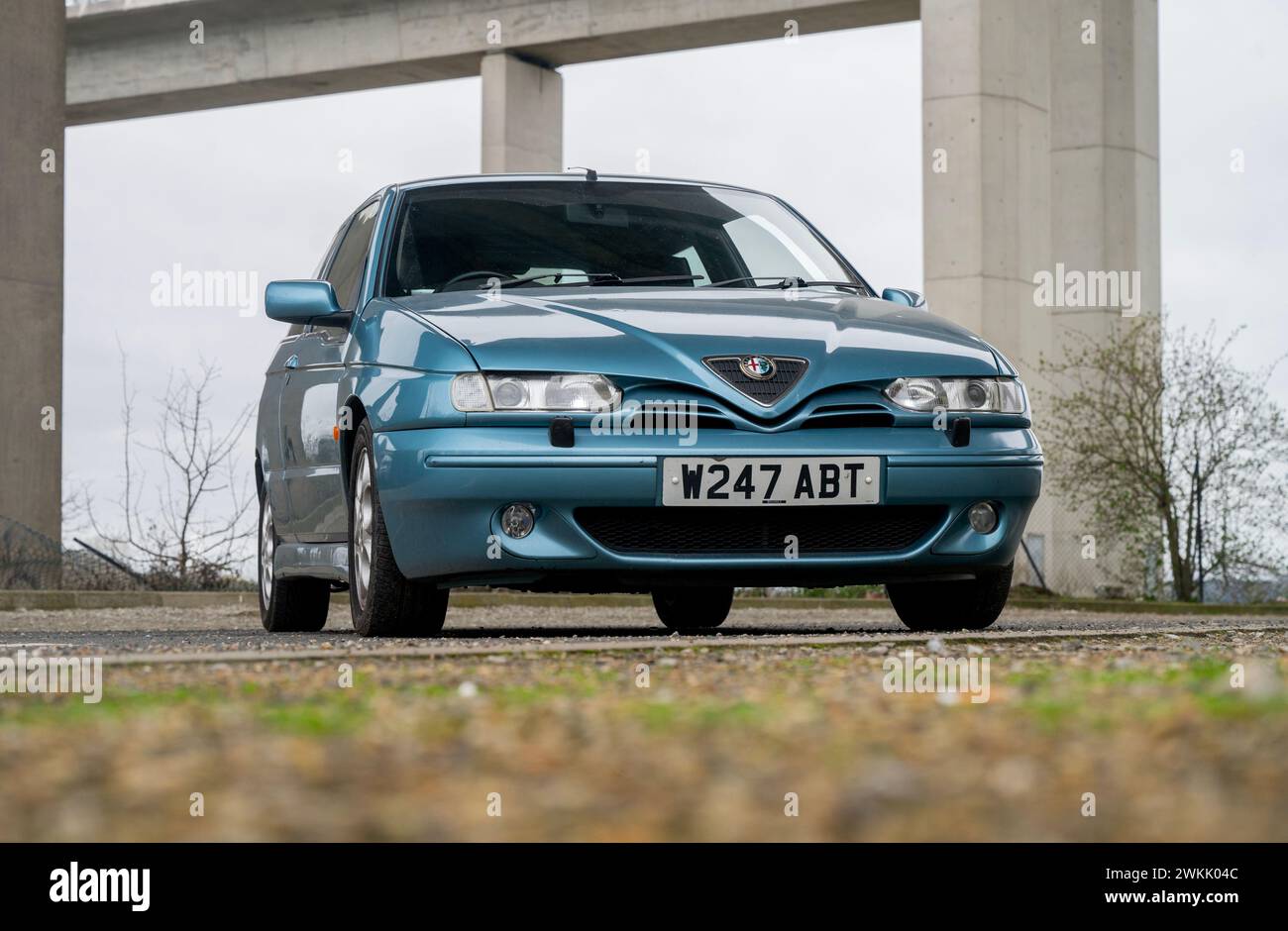 Alfa Romeo 145 Cloverleaf, Phase 2 facelift in Azzurro Fantasia blue from year 2000 Stock Photo