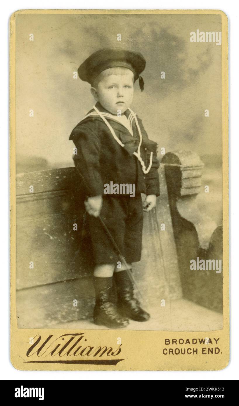 Original, charming, Victorian Carte de Visite ( visiting card or CDV) of  cute young boy about 3 or 4 years old wearing a fashionable sailor suit. From the studio of Alfred Williams of Broadway, Crouch End, London, U.K. Circa 1880's . Stock Photo