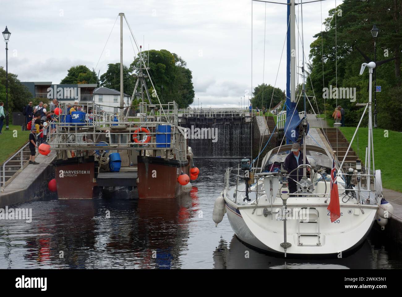 Sailing Boats/Yachts Waiting by Loch Gate on the Caledonian Canal at 'Neptunes Staircase' in Corpach near Fort William in the Highlands of Scotland. Stock Photo