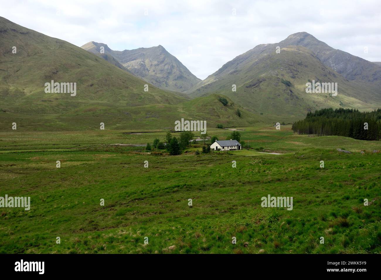 The Corbett 'Streap' and the Munro 'Sgurr Thuilm' above the Remote  Farming Hamlet of Strathan, Glen Dessarry in the Scottish Highlands, Scotland, UK. Stock Photo