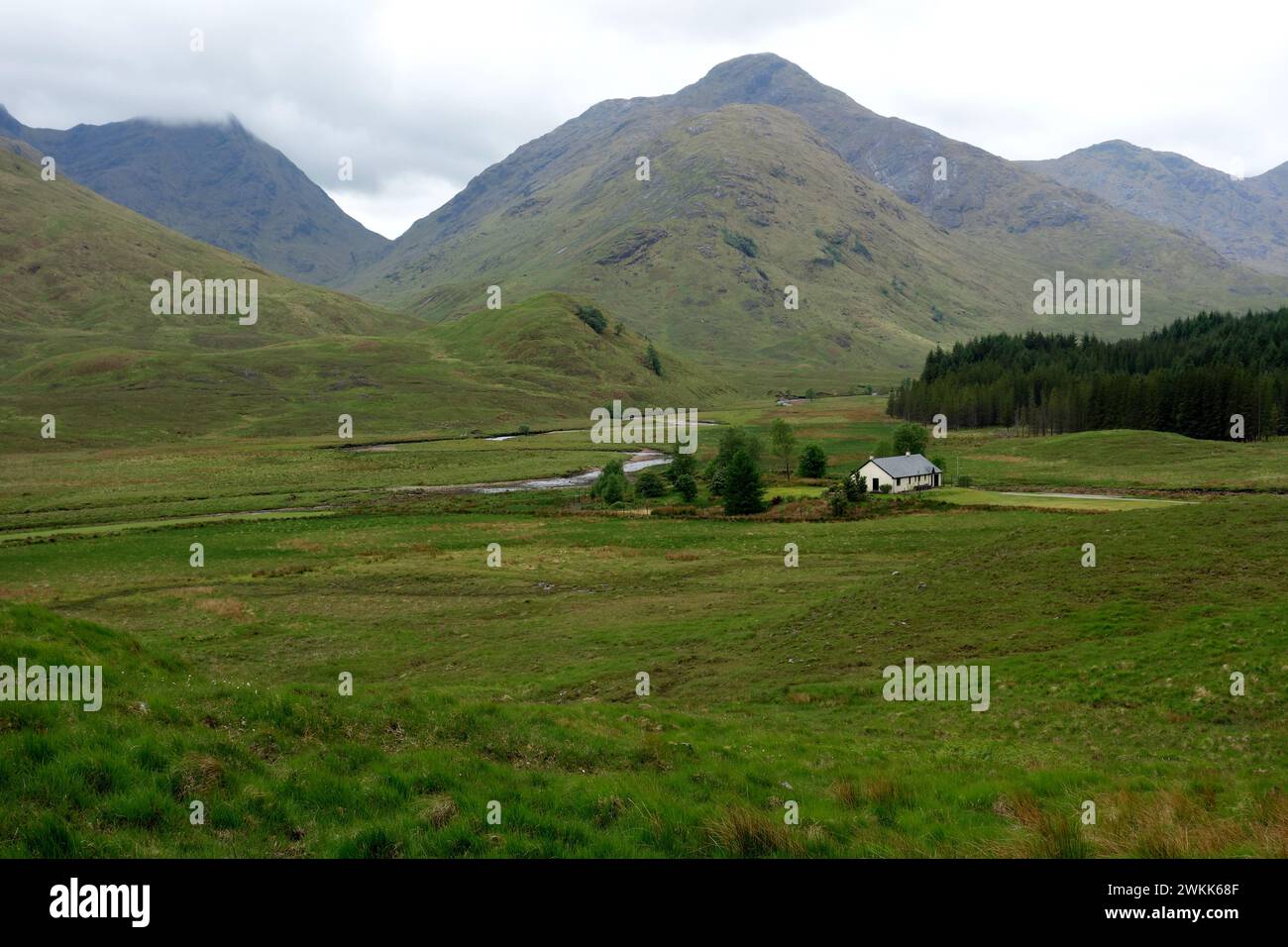 The Corbett 'Streap' and the Munro 'Sgurr Thuilm' above the Remote  Farming Hamlet of Strathan, Glen Dessarry in the Scottish Highlands, Scotland, UK. Stock Photo