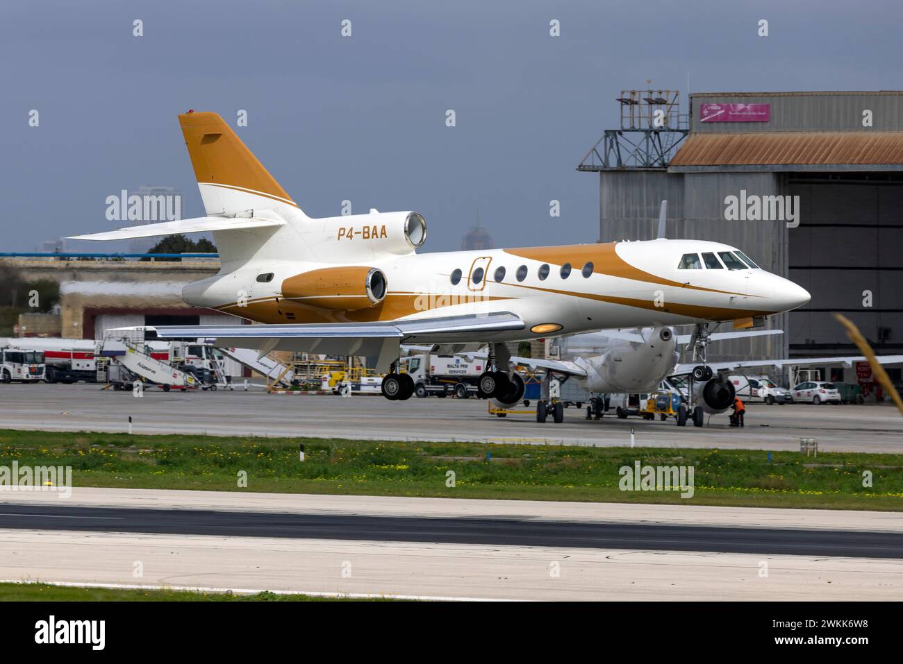 Dassault Falcon 50EX (REG: P4-BAA) landing runway 13. Stock Photo
