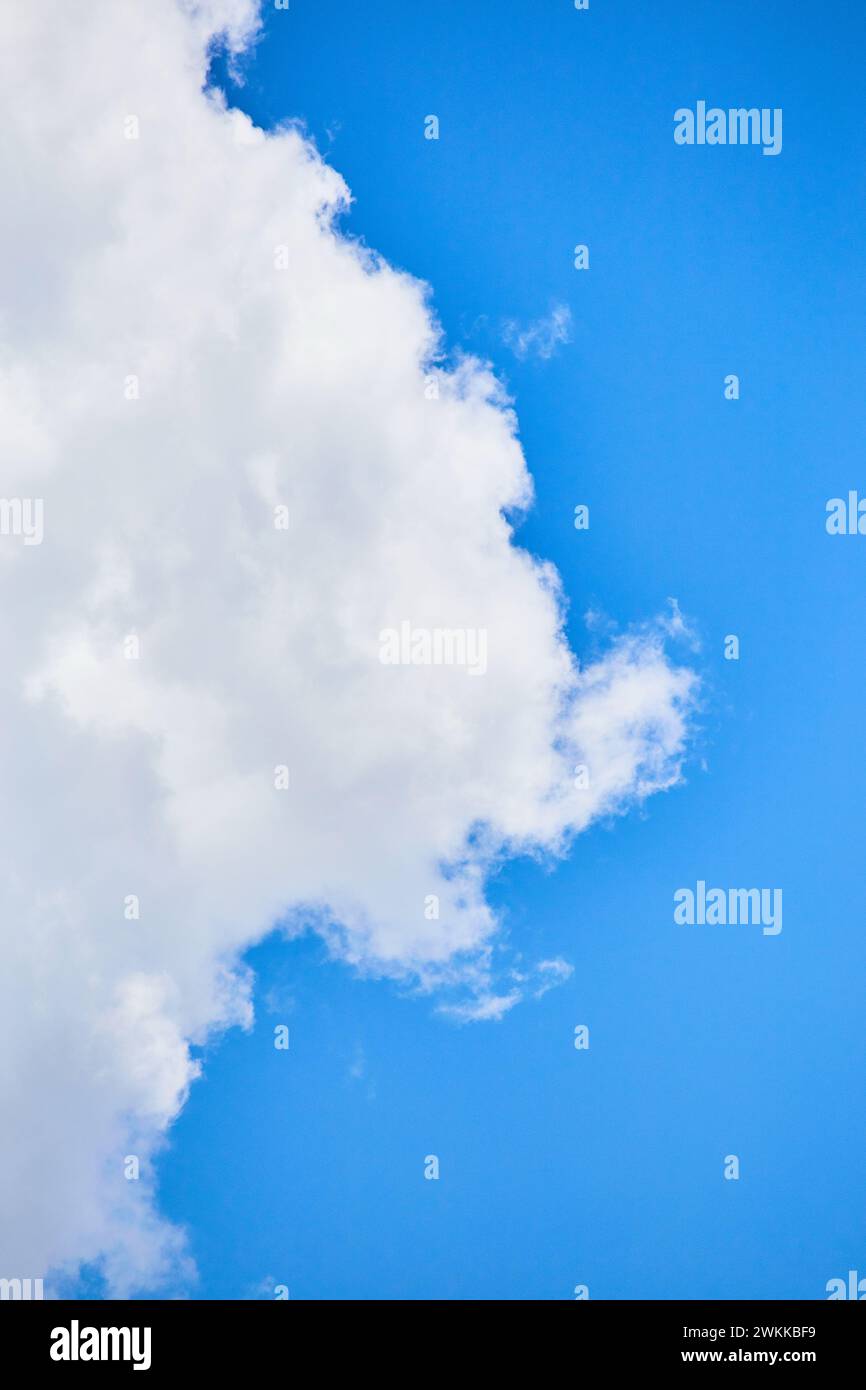 Serene Blue Sky with Fluffy White Clouds in Daylight Stock Photo - Alamy