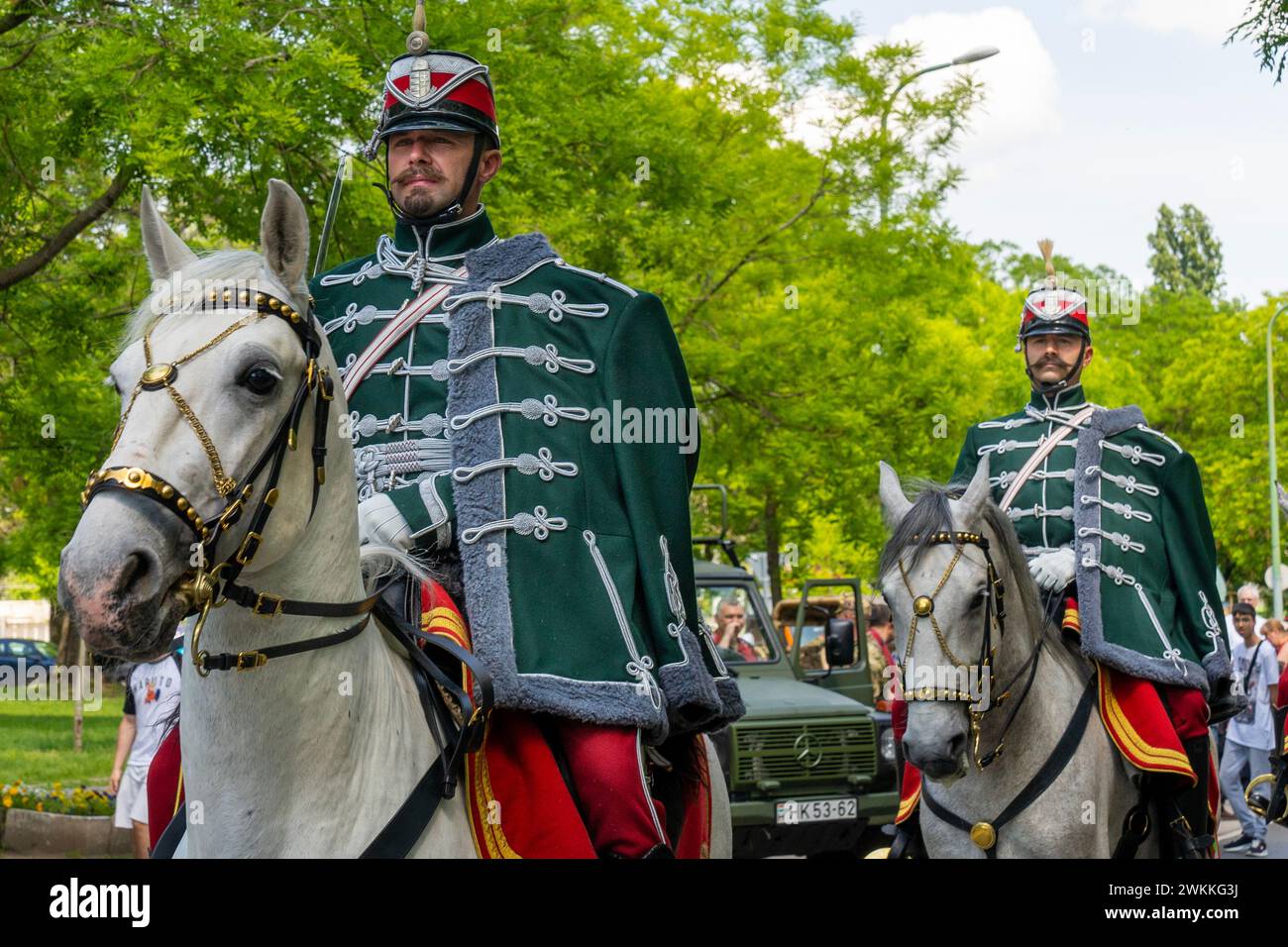 Hungarian hussars in traditional uniform ride in Budapest on National Defense Day. Budapest, Hungary - May 21, 2023 Stock Photo