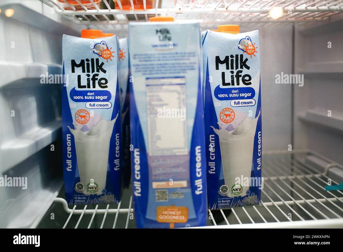 Close up a group of Milk Life Full Cream on the fridge Stock Photo