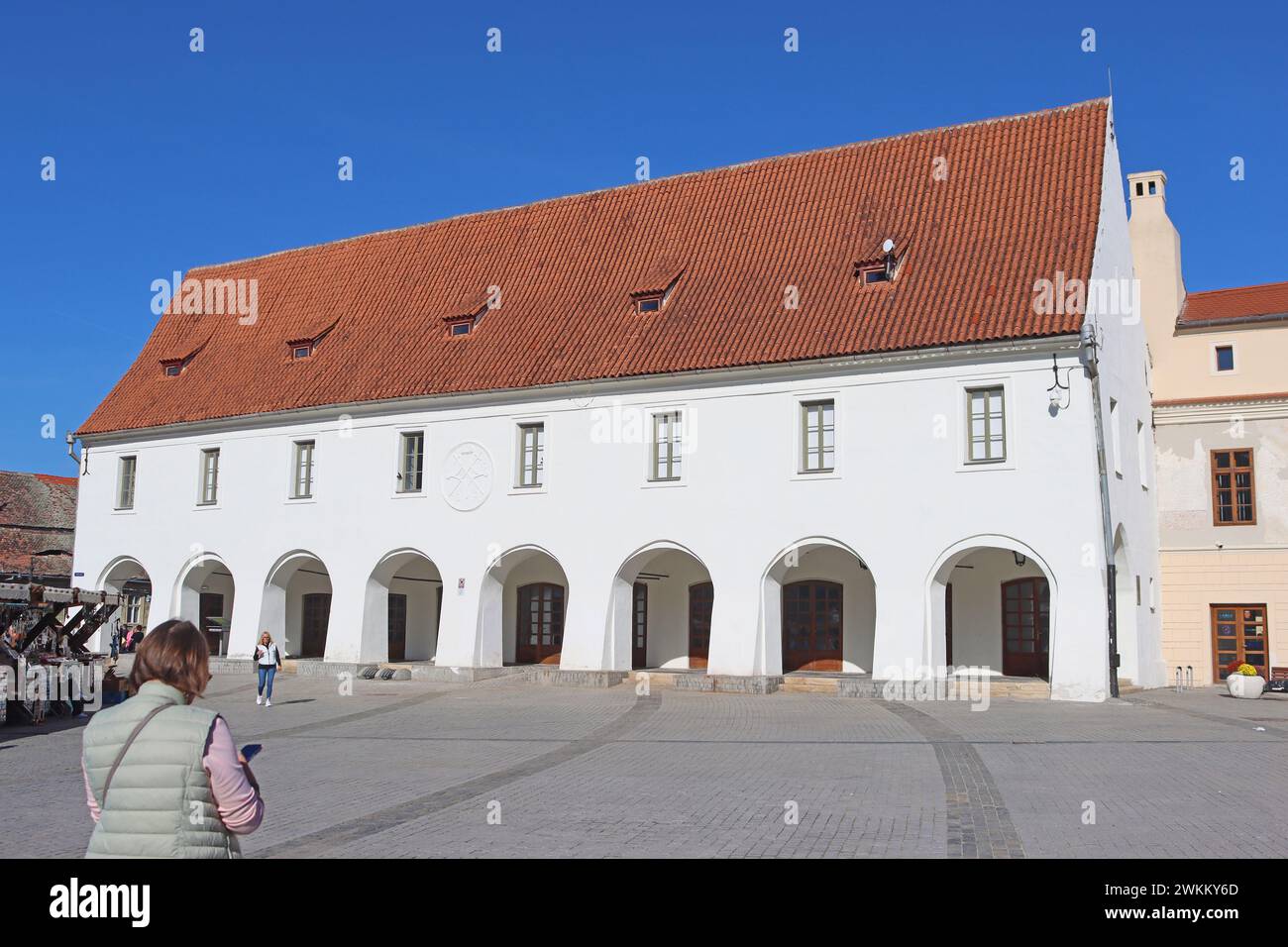 Sibiu, Romania - October 14, 2023: White building on Small Square Stock Photo