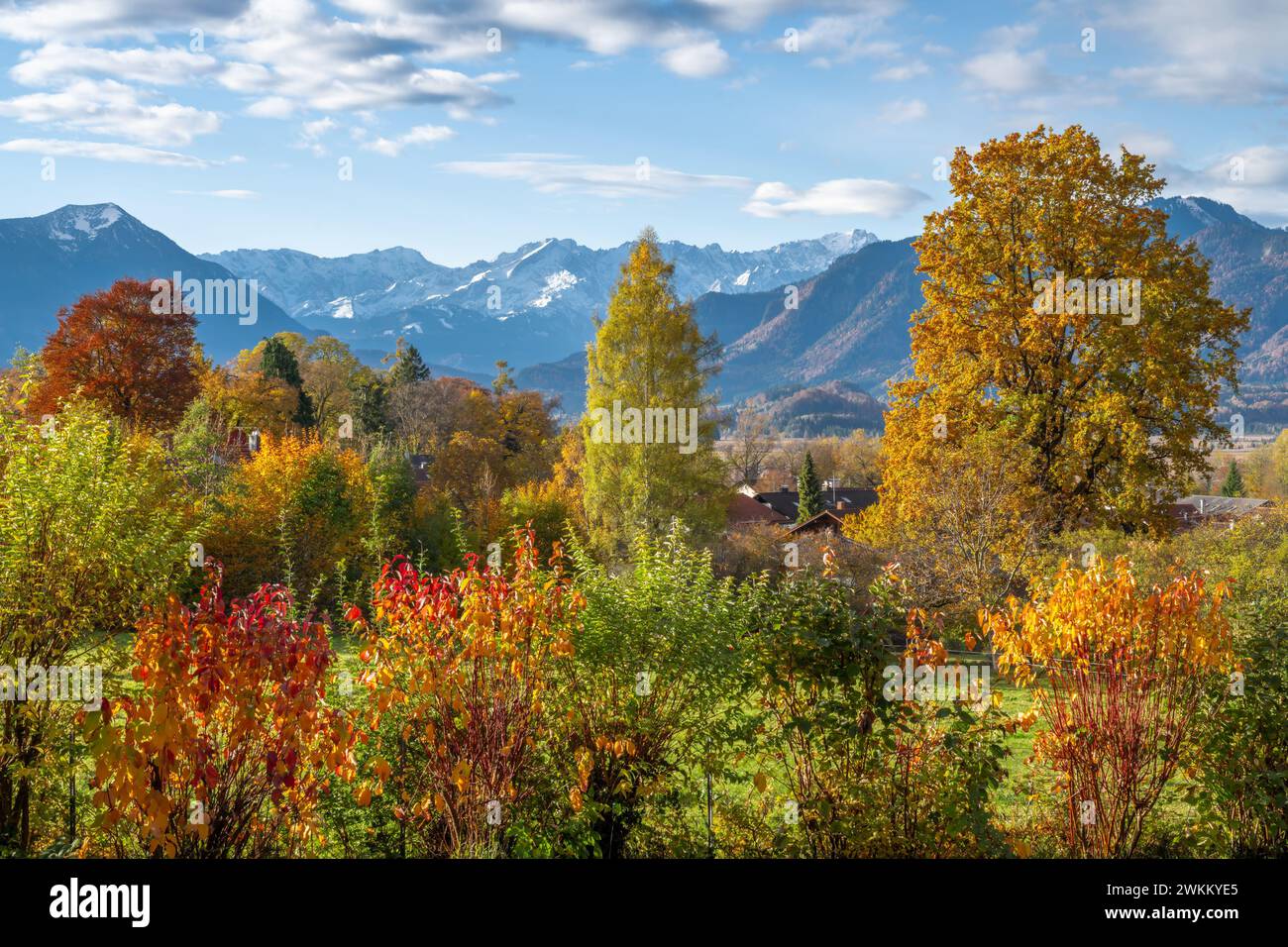 Autumn scenic with the view from the town Murnau to the alps Stock Photo