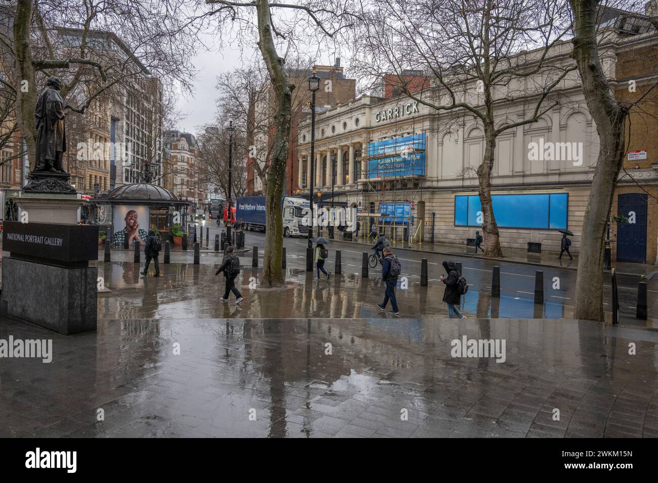 London, UK. 21st Feb, 2024. People walk to work on a wet and gloomy morning in Charing Cross Road, London, UK. Credit: Malcolm Park/Alamy Live News Stock Photo