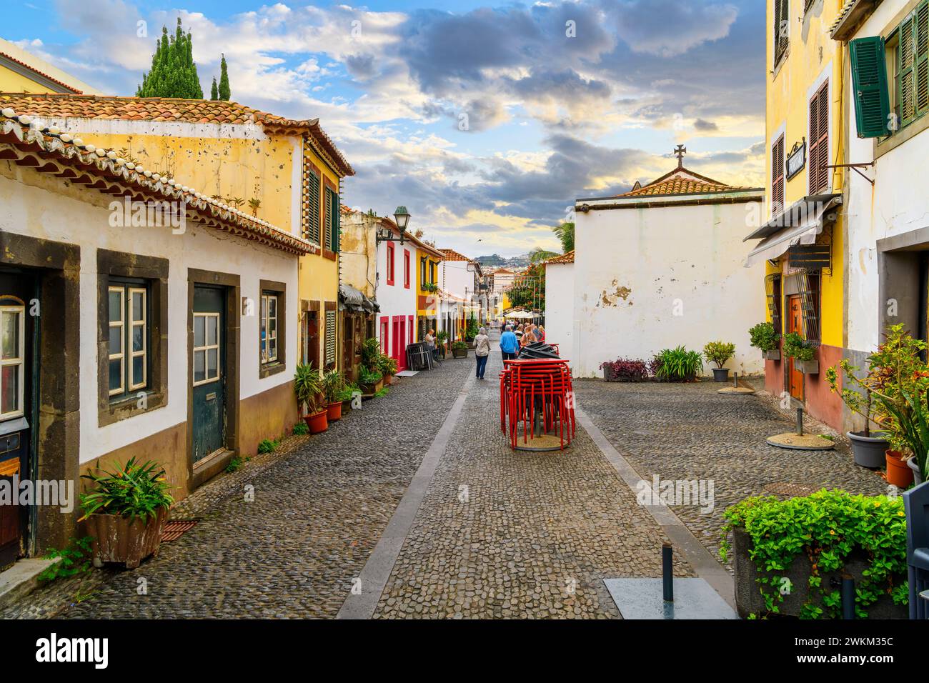 The famous Rua de Santa Maria narrow street of cafes, colorful doors and shops in the historic medieval old town of Funchal, Madeira Portugal. Stock Photo