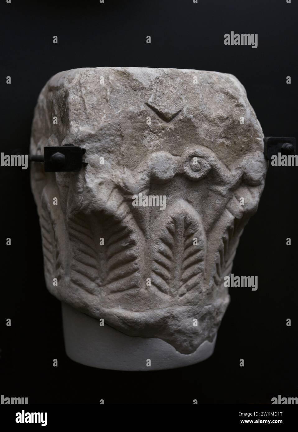 Capital decorated with acanthus leaves. Marble. 7th century. Museum of Visigoth Councils and Culture. Toledo, Castile-La Mancha, Spain. Stock Photo
