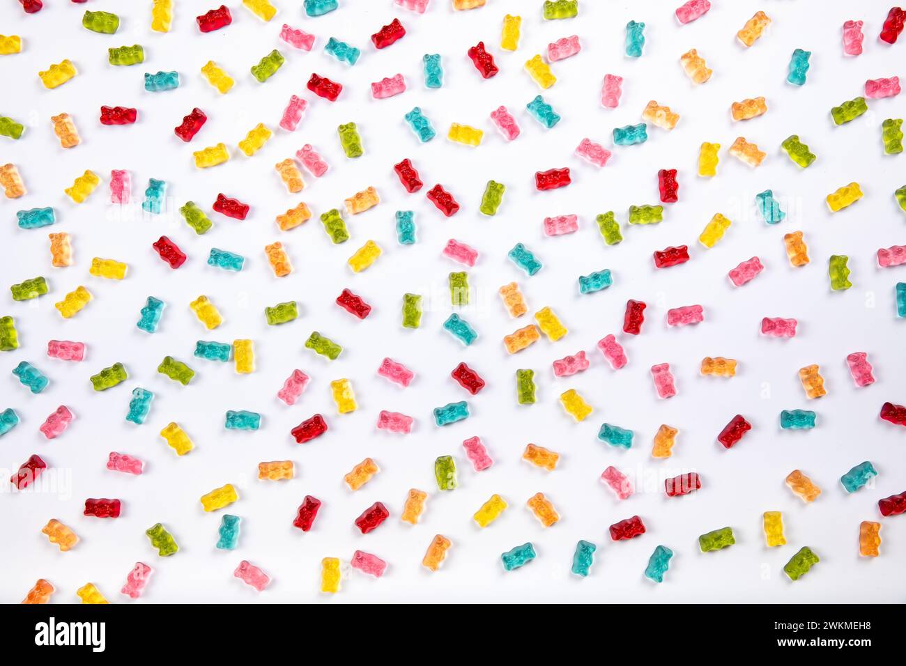 Colorful Gummy Bears Texture Background - Sweet Candy Delights on White Background Stock Photo