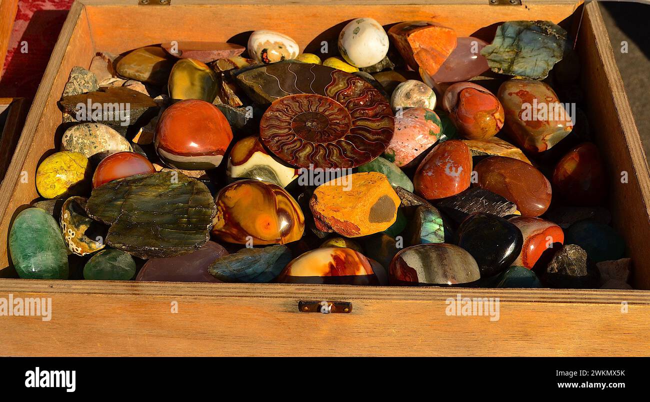 Polished rock and bead display at farmers market Stock Photo Alamy