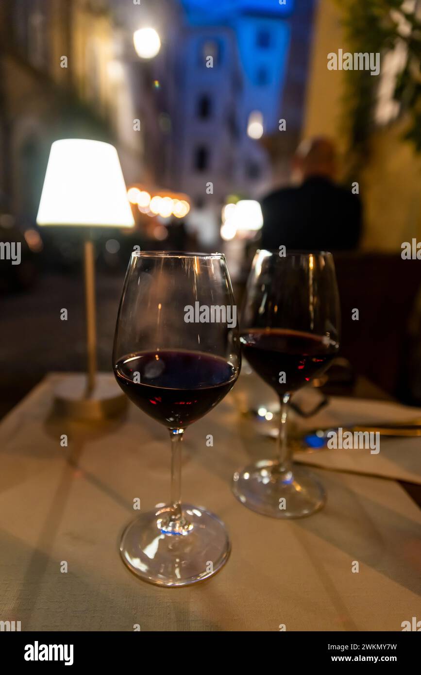 Dining as night falls on a side street in Rome near the Pantheon. Stock Photo