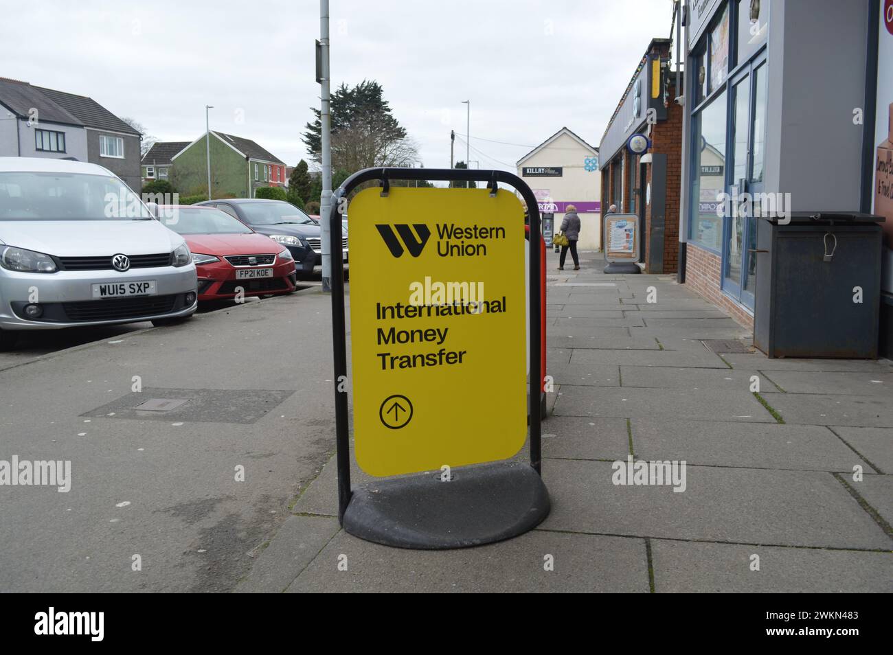 Western Union Money Transfer Sign, Killay, Swansea, Wales, United Kingdom. 16th February 2024. Stock Photo