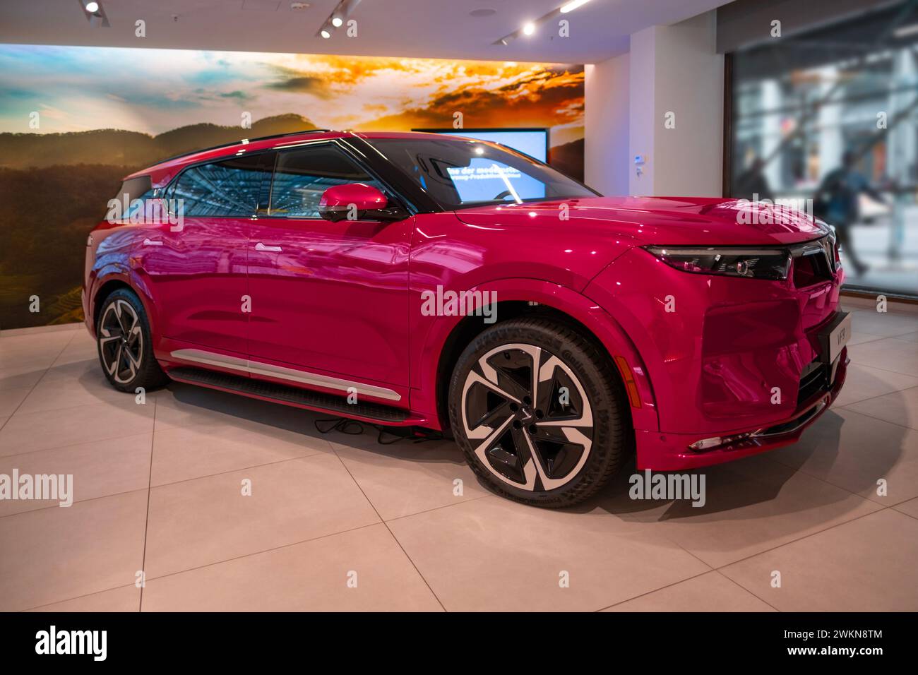 large pink Vinfast vf 9 electric SUV, advanced technologies in vietnamese automotive industry, Environmental sustainability, Car dealerships, test dri Stock Photo