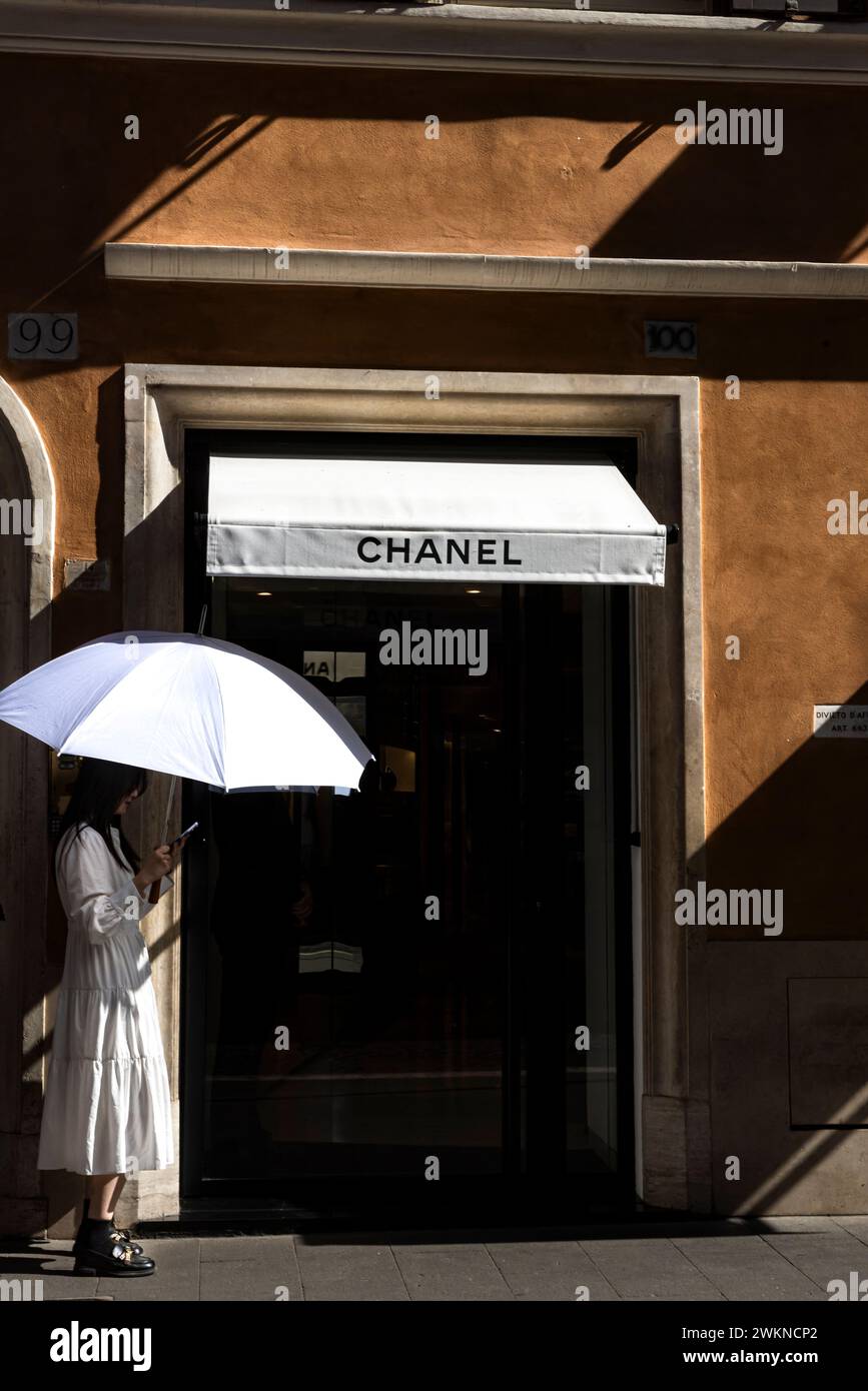Daily life in Italy where patrons line up to visit high end stores near