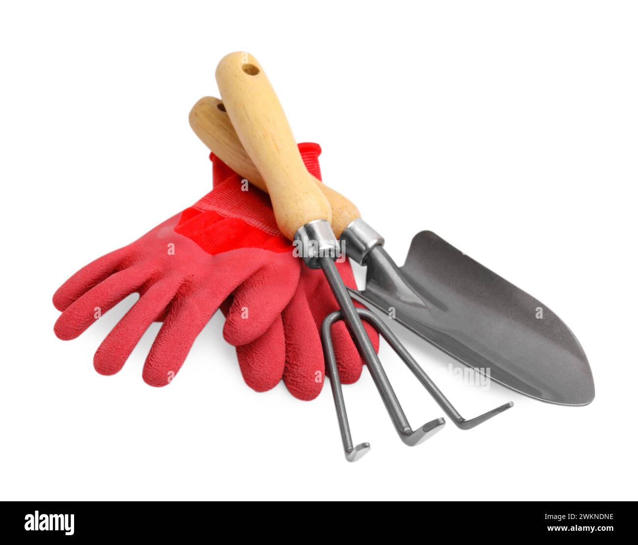 Gardening gloves, trowel and rake isolated on white Stock Photo - Alamy