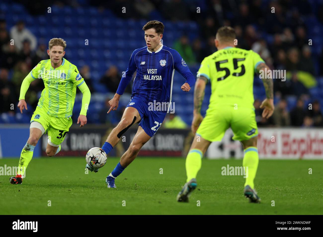 Cardiff, UK. 20th Feb, 2024. Rubin Colwill of Cardiff City (c) in ...