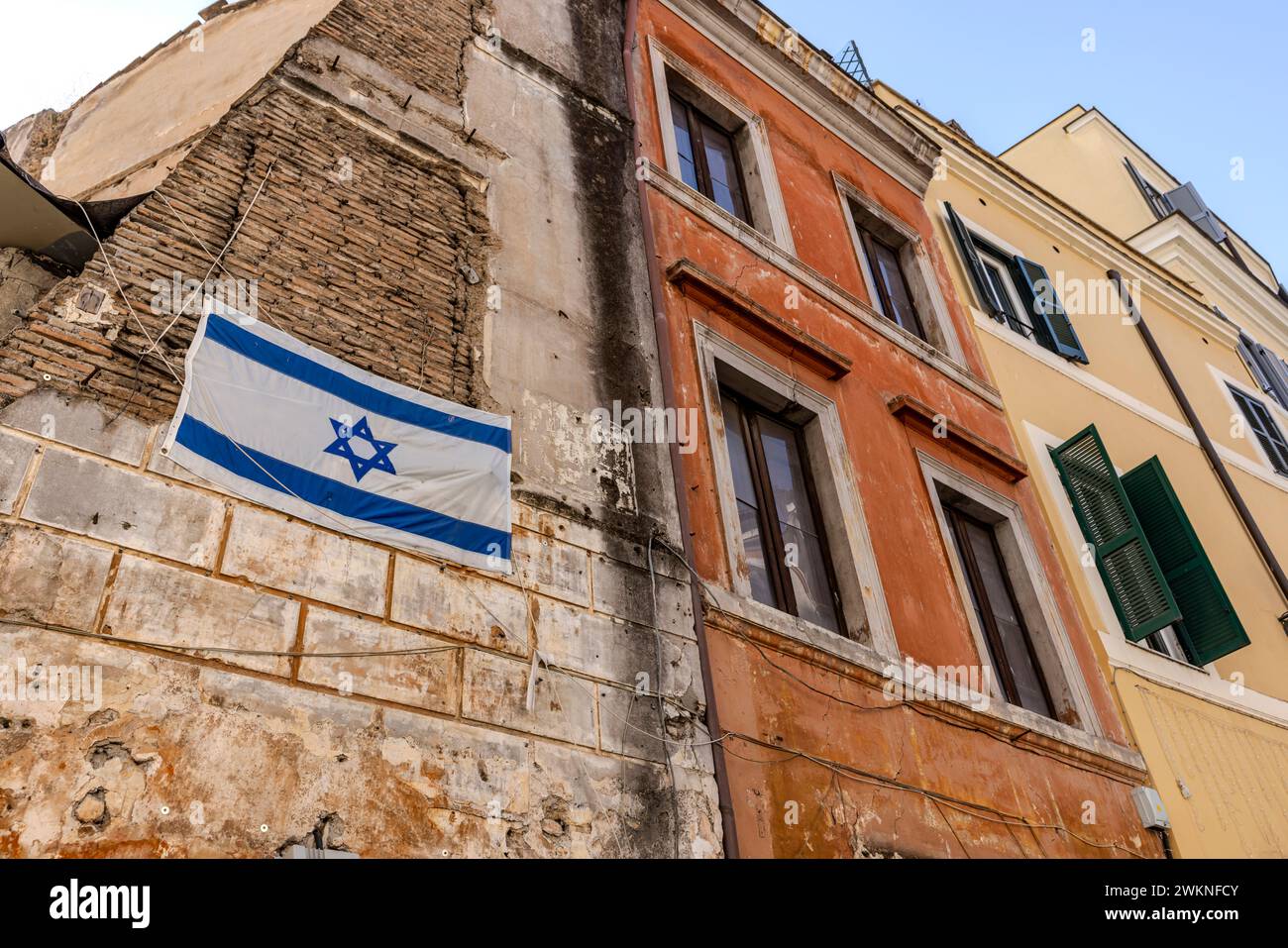 The Israeli Flag hangs from a wall in the Jewish Ghetto of Rome, Italy. Stock Photo