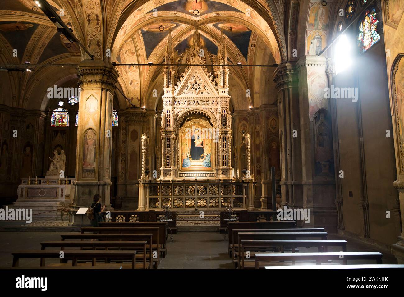 The Orsanmichele church, once a Gothic warehouse, was turned into a church after a image of the Madonna appeared inside. Many of Florence's masters co Stock Photo