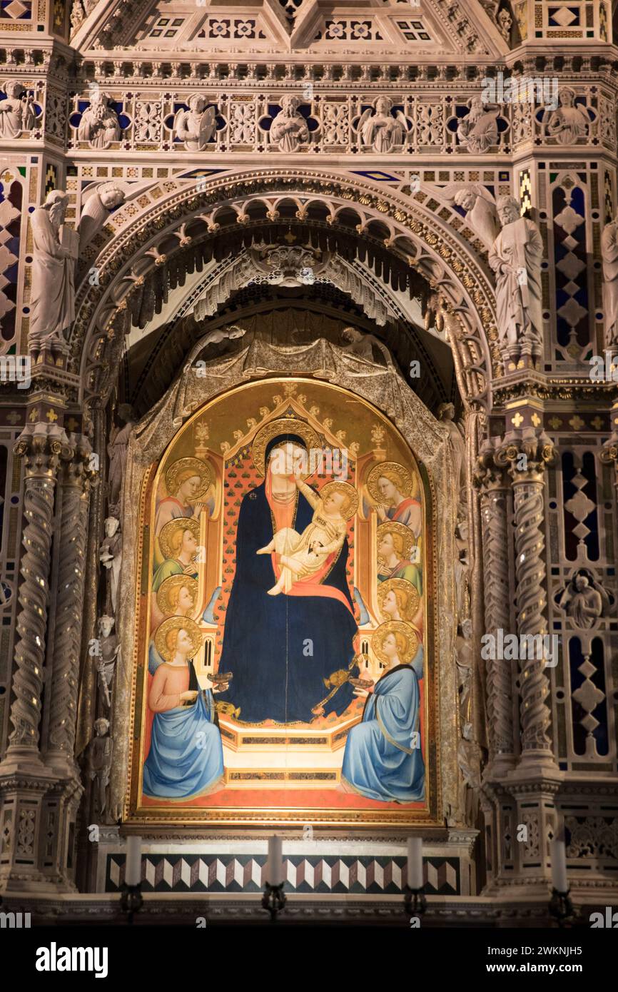 The Orsanmichele church, once a Gothic warehouse, was turned into a church after a image of the Madonna appeared inside. Many of Florence's masters co Stock Photo