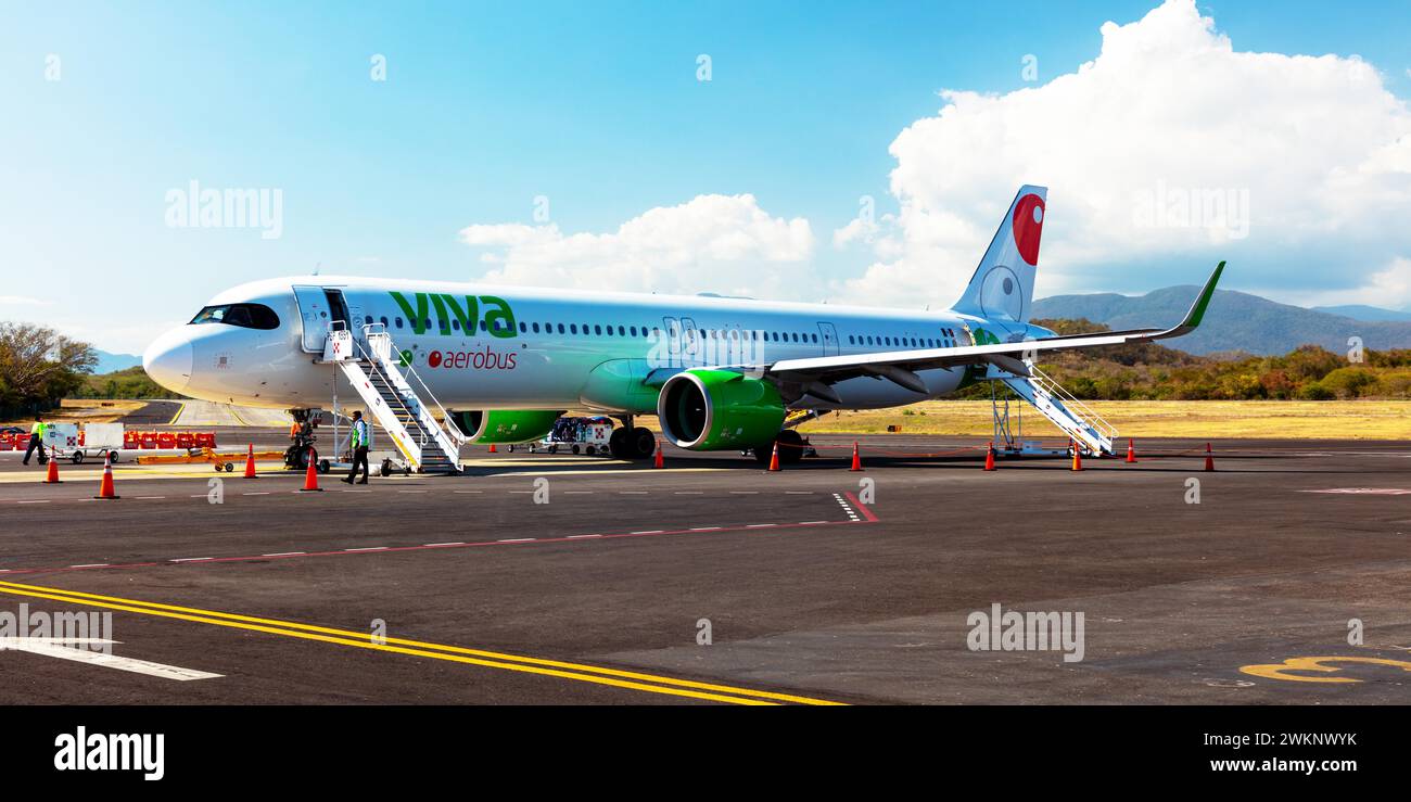 Aircraft of the airline Viva aerobus at the airport of Huatulco, Baja
