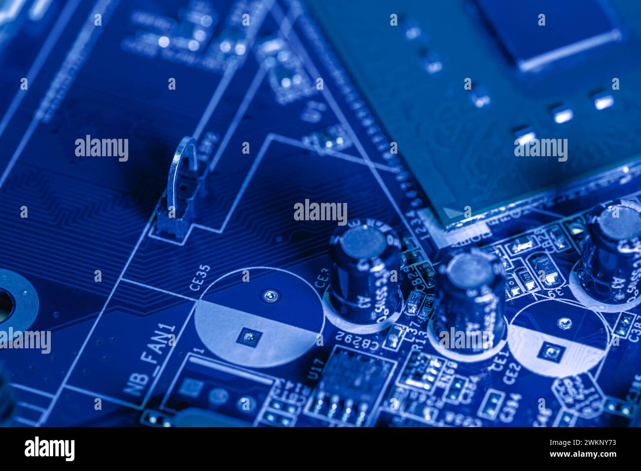 electronic components and microchips on computer circuit board. extreme closeup. Stock Photo