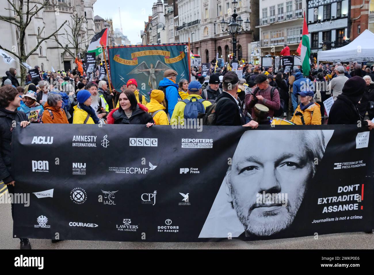 London, UK, 21st February, 2024. Julian Assange supporters march to Downing Street for a rally after the second and final day of a High Court hearing challenging the extradition of the WikiLeaks founder to the US, where he could face 175 year prison sentence. Credit: Eleventh Hour Photography/Alamy Live News Stock Photo