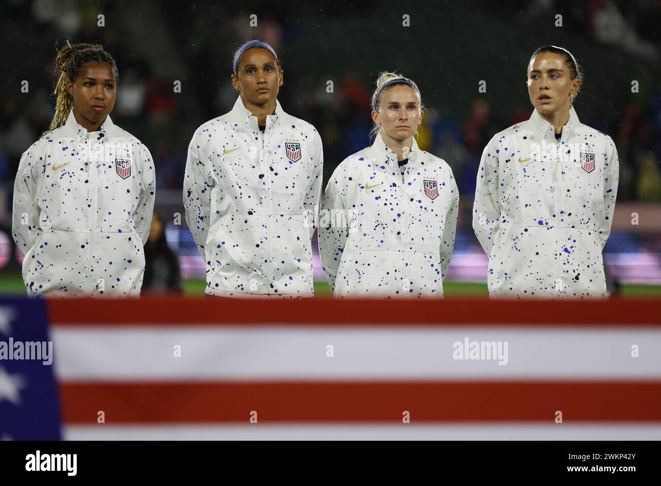 Carson, California, USA. 20th Feb, 2024. United States forward MIDGE PURCE (9), forward LYNN WILLIAMS (6), defender JENNA NIGHSWONGER (3), and defender ABBY DAHLKEMPER (2) stand for the playing of the national anthem before the first half of a CONCACAF W Gold Cup group stage match between the United States and the Dominican Republic at Dignity Health Sports Park in Carson, California. (Credit Image: © Brenton Tse/ZUMA Press Wire) EDITORIAL USAGE ONLY! Not for Commercial USAGE! Stock Photo