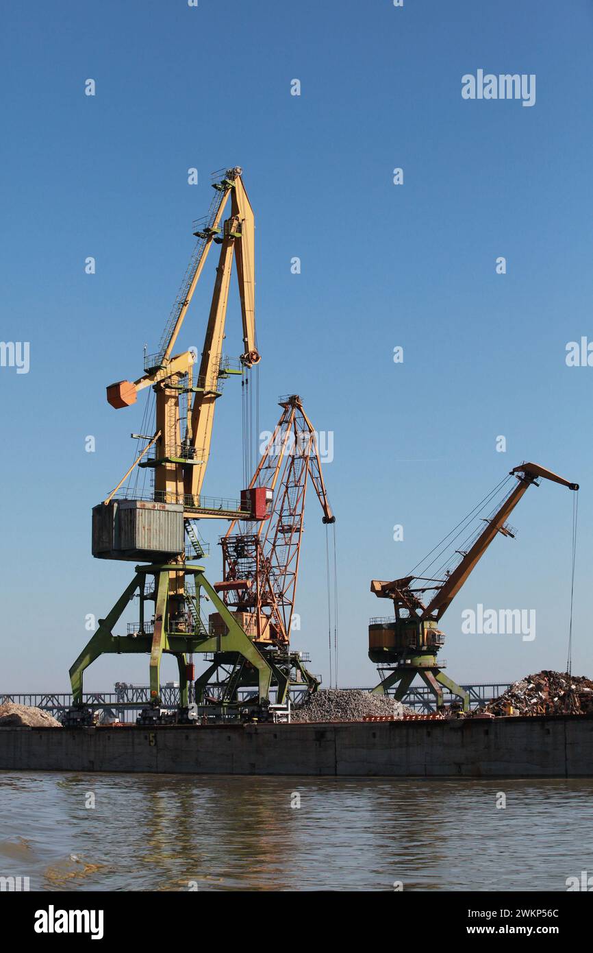 Blue cargo cranes stand hi-res stock photography and images - Alamy