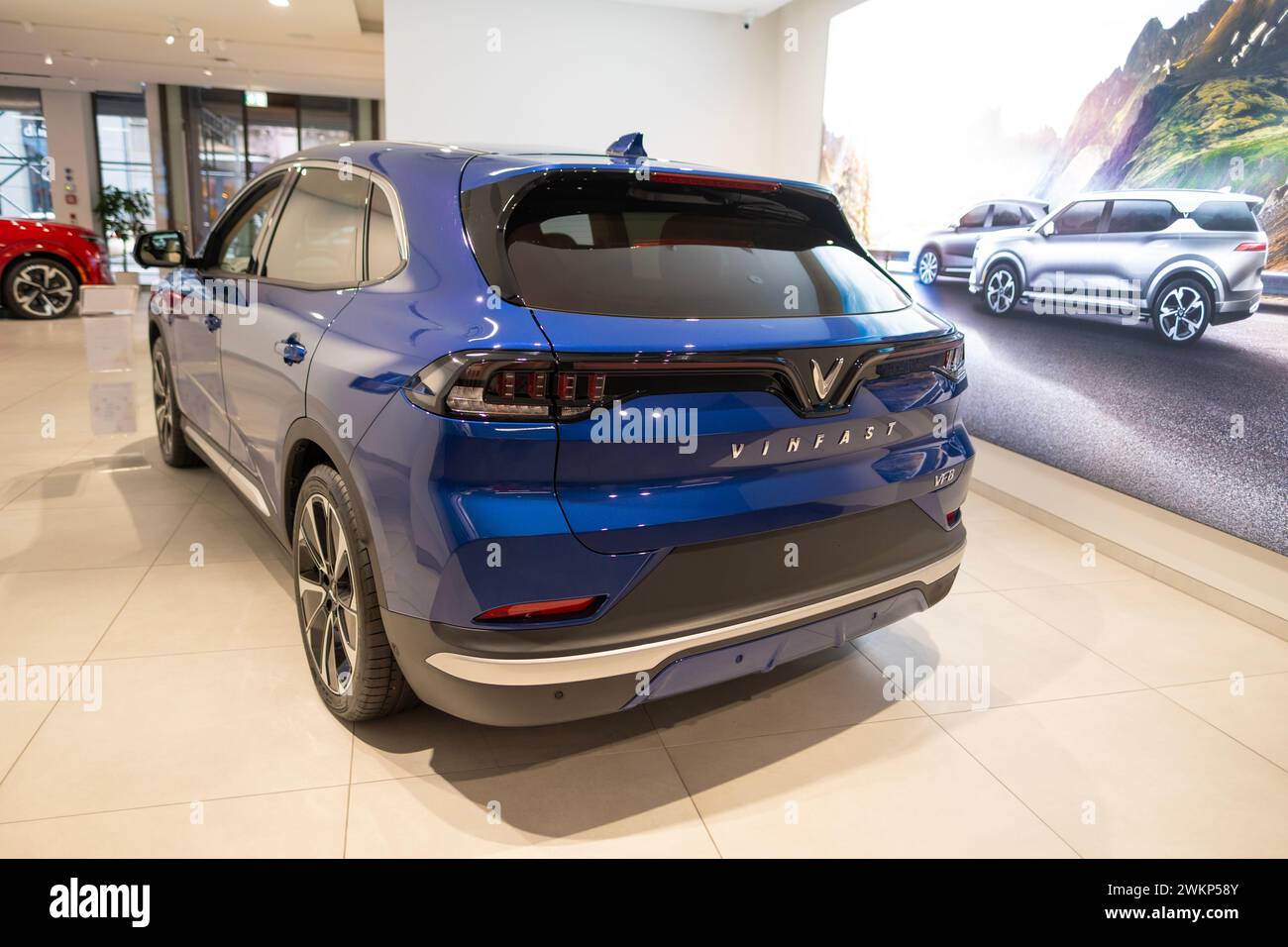 new blue Vinfast vf 8 electric crossover in Studio, advanced