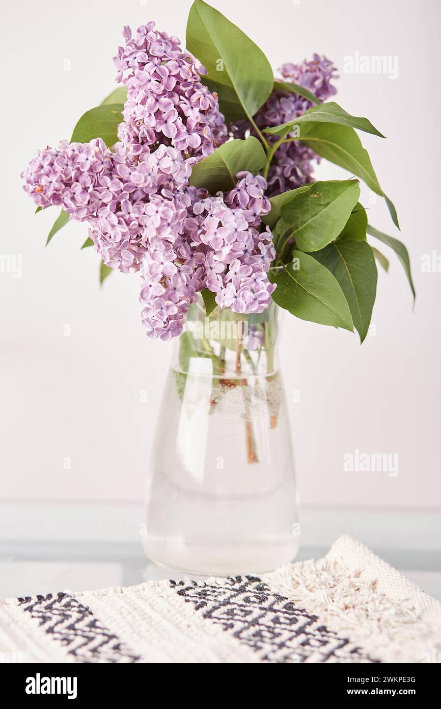 Lilac flowers bouquet, cozy aesthetics home. Stock Photo