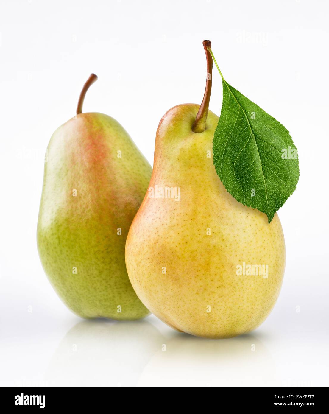 fresh, ripe pear on white with leaf background Stock Photo - Alamy