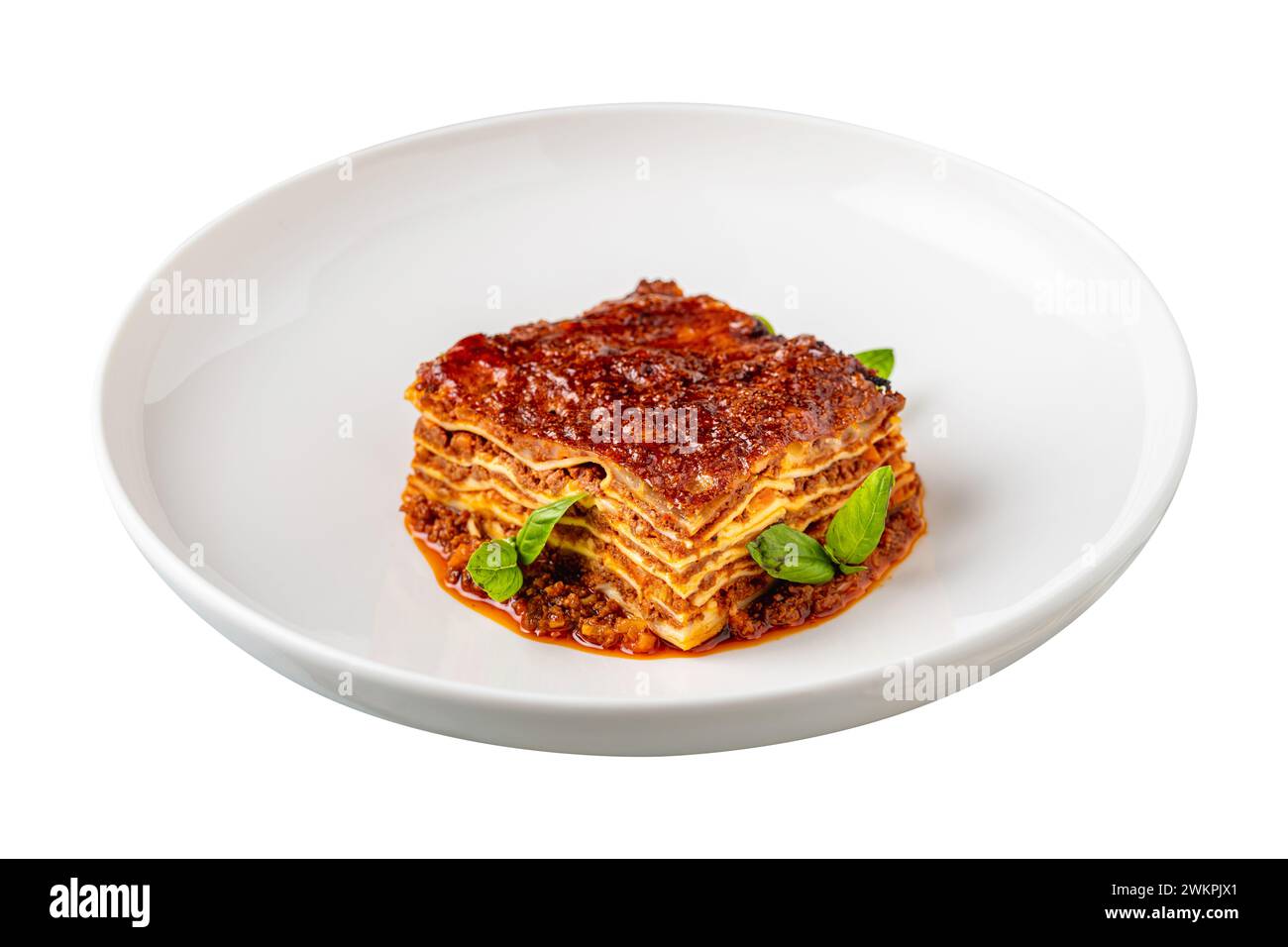 Bechamel sauce and minced meat lasagna on white background Stock Photo