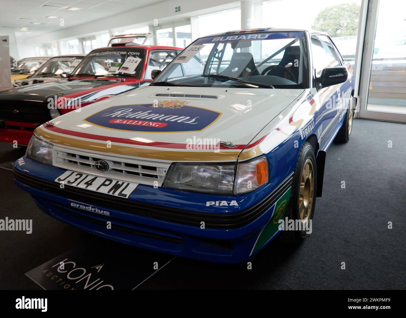 Three-quarters front view of a 1992,  Subaru Legacy RS 'Group A' Ex-Colin McRae , on sale in the Iconic Auction, at the 2023 Silverstone Festival Stock Photo