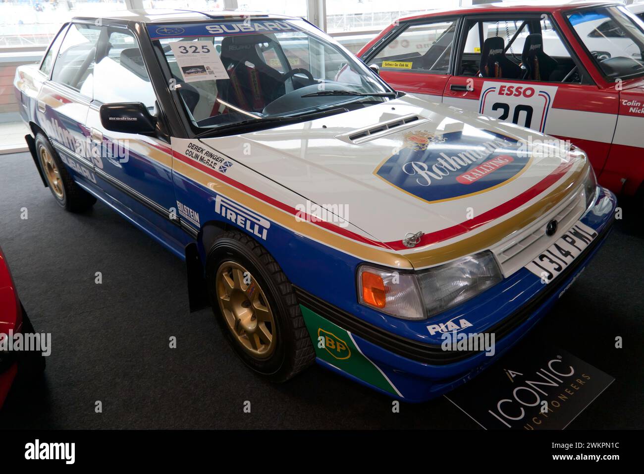 Three-quarters front view of a 1992,  Subaru Legacy RS 'Group A' Ex-Colin McRae , on sale in the Iconic Auction, at the 2023 Silverstone Festival Stock Photo